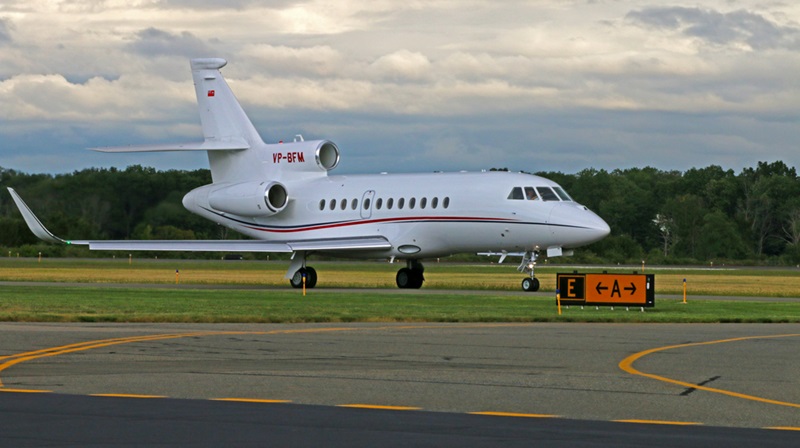 Dassault Falcon 900LX with marking VP-BFM taxiing toward the runway to take off from Morristown Municipal Airport in New Jersey