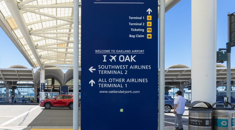 Navigating to Terminal 1 via Crosswalk with Signage Visible at Oakland International Airport