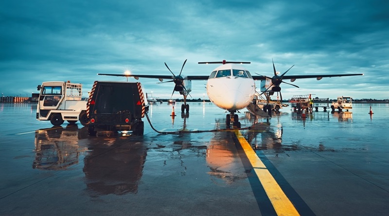 busy airport in rain